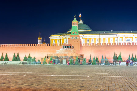 Red square with Spasskaya tower of Moscow Kremlin, Lenin Mausoleum and Senate palace at night, Russiaのeditorial素材