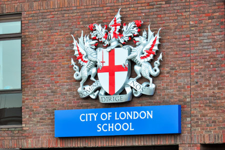 City of London school emblem on wall in London, UKのeditorial素材