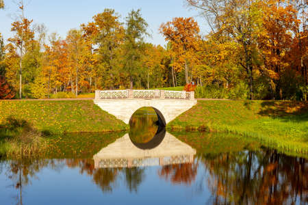 Bridge in Alexander park in autumn, Pushkin (Tsarskoe Selo), Saint Petersburg, Russiaの写真素材