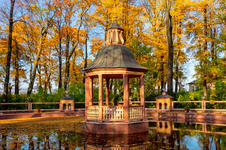 Gazebo and pond in Summer garden in autumn, Saint Petersburg, Russiaのeditorial素材