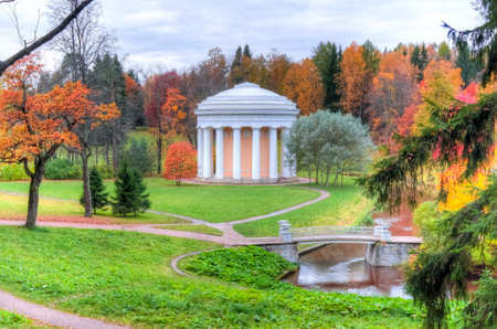 Temple of friendship in golden fall in Pavlovsky park, Pavlovsk, Saint Petersburg, Russiaのeditorial素材