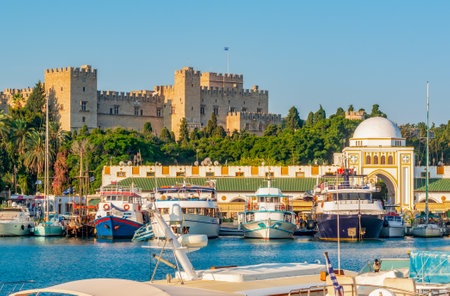 Mandraki harbor with Rhodes fortress and New market (Nea Agora), Rhodes, Greeceのeditorial素材