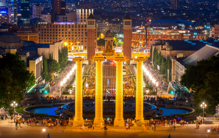 Columns of Montjuic and Venetian columns on Spain square in Barcelona at nightのeditorial素材