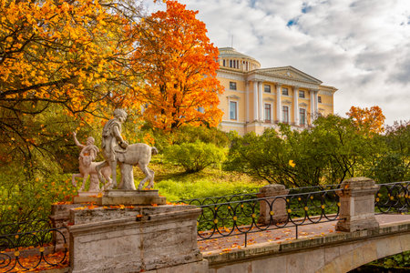 Pavlovsk palace and Centaur bridge statue in Pavlovsky park in autumn, Saint Petersburg, Russiaの写真素材