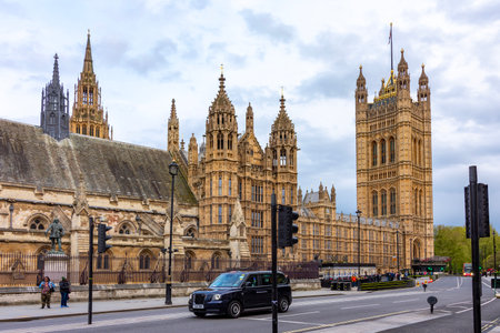 London, UK - 28 April 2024: Houses of Parliament (Westminster palace) with Victoria tower on Parliament squareの写真素材