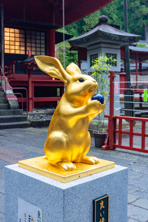 Nikko, Japan - 16 November 2024: Statue of golden bunny in Nikko Toshogu shrineの写真素材