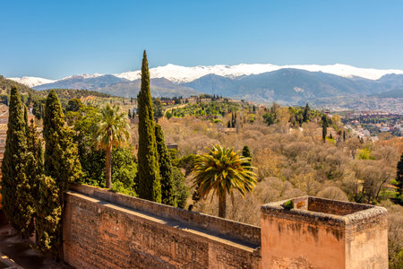 Alcazaba fortress of Alhambra with Sierra Nevada mountains at background, Granada, Spainの写真素材