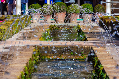 Fountains in Generalife gardens at Alhambra, Granada, Spainの写真素材