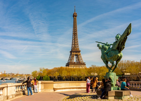Paris - 03 April 2025: France Reborn statue on Bir-Hakeim bridge and Eiffel towerの写真素材