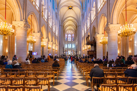 Paris, France - 02 April 2025: Notre-Dame de Paris Cathedral interiors after restoration