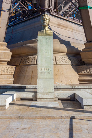 Statue of architect Gustave Eiffel under Eiffel tower, Paris, Franceの写真素材