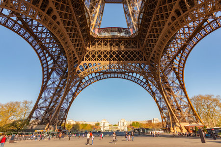 Paris, France - 03 April 2025: Eiffel tower seen from the bottom