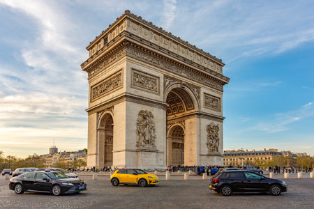 Paris, France - 03 April 2025: Triumphal arch (Arc de Triomphe) on Charles de Gaulle square at...