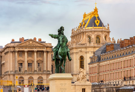 Paris, France - 04 April 2025: Monument to king Louis XIV and Royal chapel of Versailles palaceの写真素材