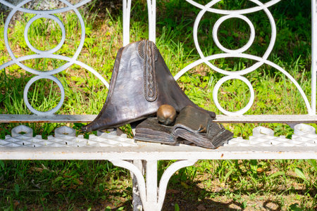 Memorial to Russian poet Alexander Pushkin with three objects (hat, apple and book) in Tsarskoye Selo, Saint Petersburg, Russiaの写真素材