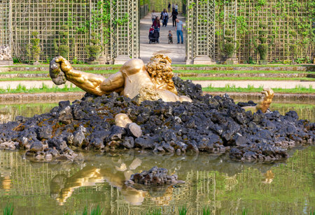 Versailles, France - 04 April 2025: Enkelados fountain in Versailles gardensの写真素材