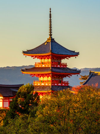 Pagoda of Kiyomizu-dera buddhist temple at autumn sunset, Kyoto, Japan