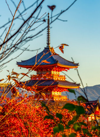 Pagoda of Kiyomizu-dera buddhist temple at autumn sunset, Kyoto, Japanの写真素材