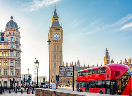 Double-decker bus on Parliament square and Big Ben tower, London, UK