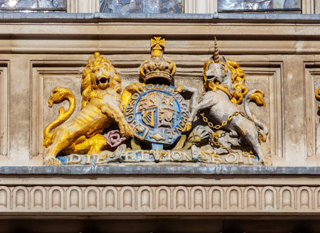 Sculptures of lion and unicorn on Westminster Abbey facade, London, UKの写真素材