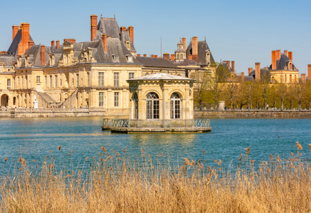 Fontainebleau palace (Chateau de Fontainebleau) and pavilion in Carp's pond outside Paris, Franceの写真素材