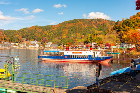 Fujikawaguchiko, Japan - 17 November 2024: Autumn momiji season at lake Kawaguchiko