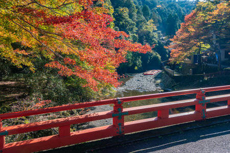 Takao bridge over Kiyotaki river in autumn, Takao mountain, Kyoto, Japanの写真素材