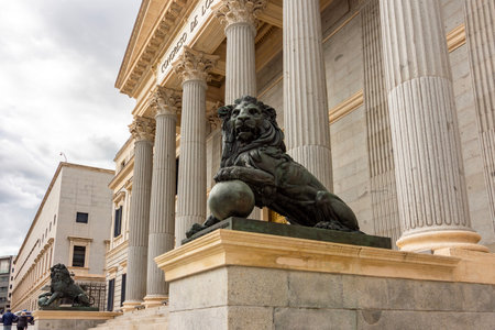 Statue of lion at Palace of Parliament (Congress of Deputies) in Madrid, Spainの写真素材