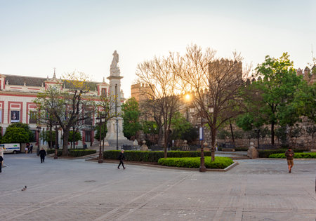 Seville, Spain - 28 March 2025: Triumph Square (Plaza del Triunfo) with Alcazar walls in Sevilleの写真素材
