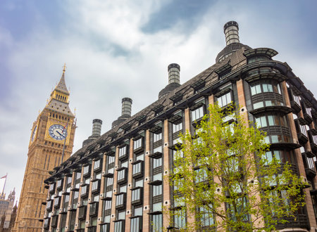 Big Ben tower and Portcullis house on Victoria embankment in London, UKの写真素材