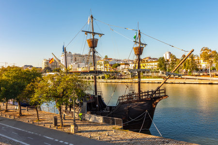 Seville, Spain - 28 March 2025: Nao Victoria 500 replica (Magellan's ship for first around the world voyage) on Seville embankmentの写真素材