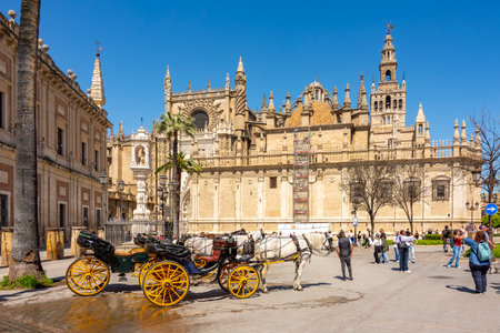 Seville, Spain - 28 March 2025: Seville cathedral on Triumph squareの写真素材