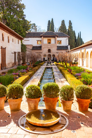 Patio de la Acequia (Water channel) in Generalife gardens at Alhambra, Granada, Spainの写真素材