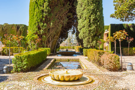 Fountains in Generalife gardens at Alhambra, Granada, Spainの写真素材