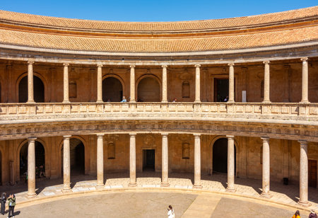 Granada, Spain - 30 March 2025: Round courtyard of Palace of Charles V in Alhambra complexの写真素材
