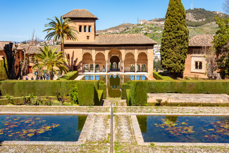 Ladies tower of Alhambra palace and gardens of Partal, Granada, Spainの写真素材