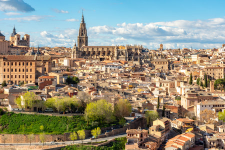 Toledo Cathedral above old town roofs, Spainの写真素材