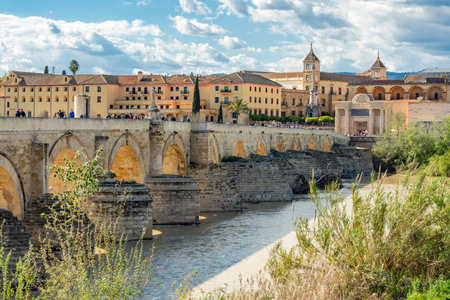 Cordoba, Spain - 27 March 2025: Roman bridge over Guadalquivir river in Andalusiaの写真素材