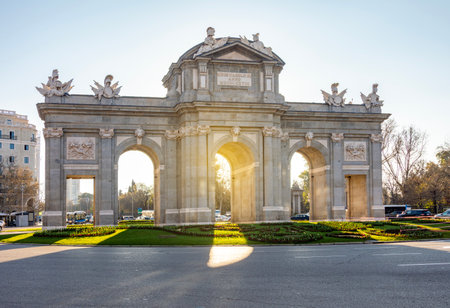 Puerta de Alcala gates in Madrid, Spain (translation "In the name of Charles III, 1778")の写真素材