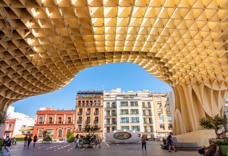 Seville, Spain - 29 March 2025: Setas de Sevilla (Mushrooms of Seville) or Metropol Parasol wood structure in Seville old quarterの写真素材