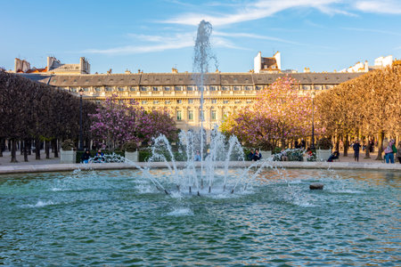 Paris, France - 31 March 2025: Fountain in Palais Royal garden in springの写真素材