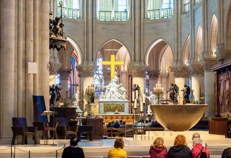 Paris, France - 02 April 2025: High Altar of Notre-Dame de Paris Cathedral after restoration