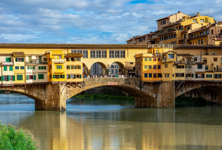 Ponte Vecchio bridge over Arno river in Florence, Italyの写真素材