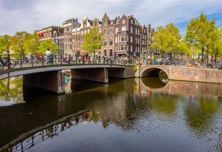 Typical Dutch architecture and bridges over Amsterdam canals, Netherlands