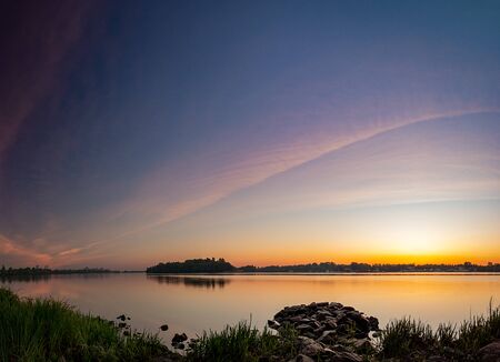 Beautiful summer sunset in the lake. HDR imageの写真素材