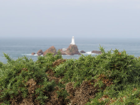Lighthouse on the coast of the Atlantic Ocean in island of BrÃ©hat, Brittany, Franceの写真素材