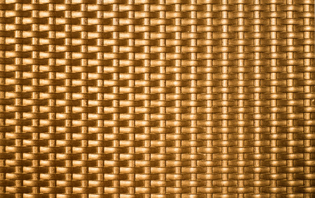 golden metal weave texture backgroundの写真素材