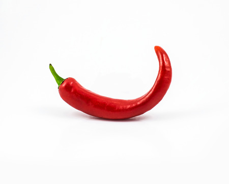 red hot chili pepper isolated on a white backgroundの写真素材