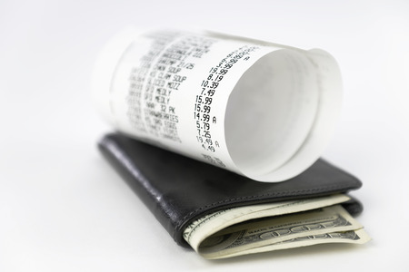 Supermarket shopping bill on white backgroundの写真素材