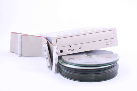 CD/DVD being being inserted into a computer.の写真素材